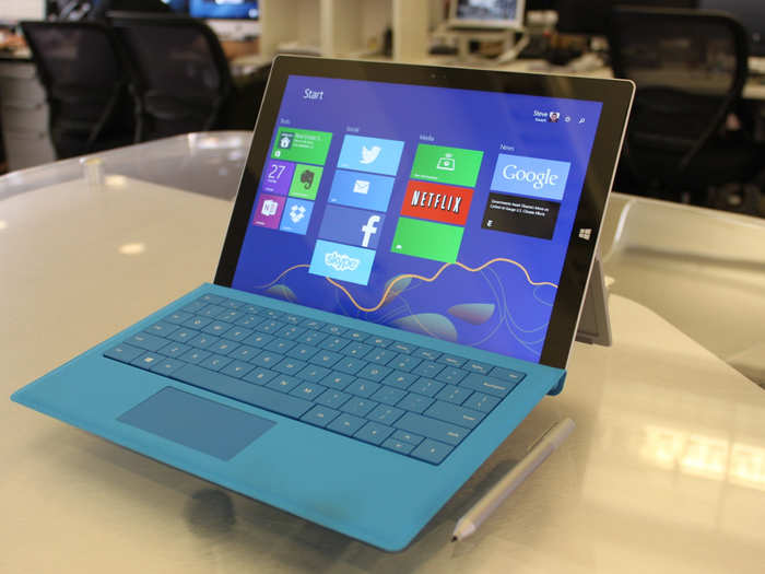 It has an optional keyboard cover. You can prop the device up with a kickstand to mimic a laptop form factor.