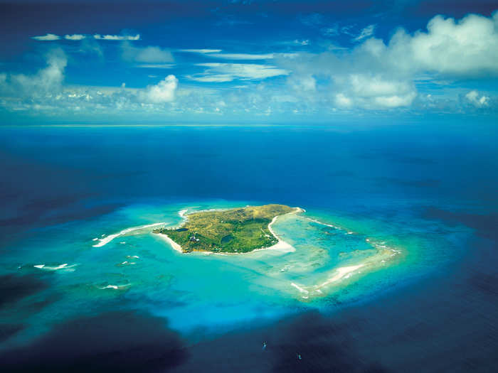 The 74-acre Necker Island is where Branson now makes his primary residence. Though some have criticized him for the move, saying he left the U.K. for tax reasons, he says he just really loves the British Virgin Islands. "I have my office here and it