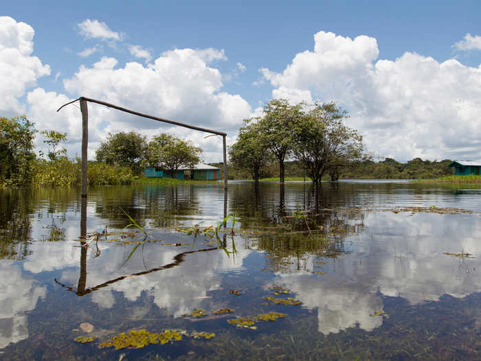 A pick-up field flooded by the river.