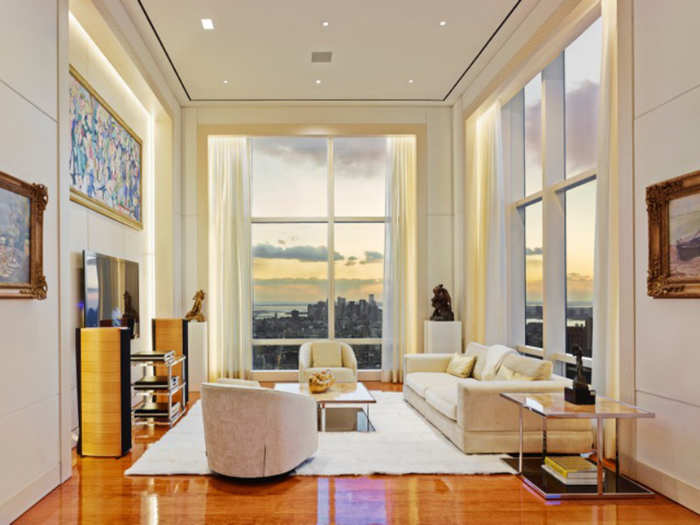 This seating area is one of many rooms in the penthouse with stunning views.