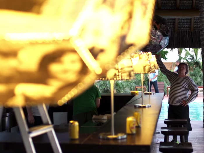 The open-air bar has a bunch of World Cup paraphernalia around.