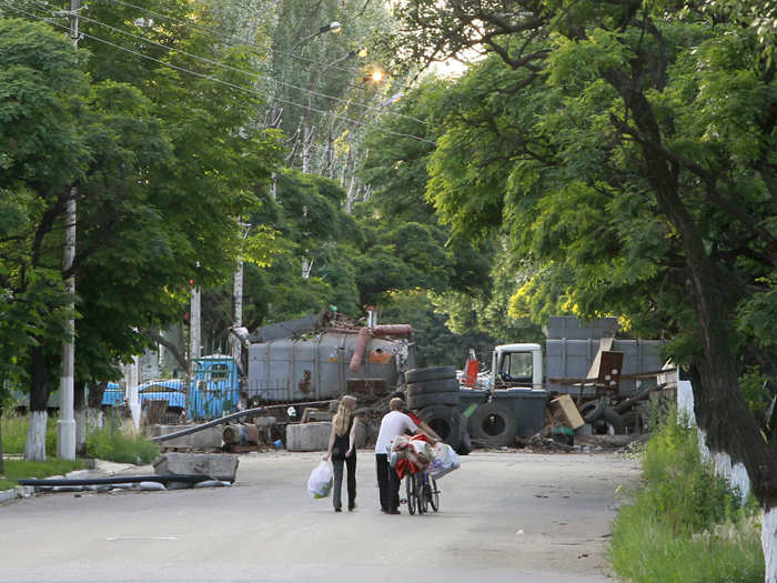 Both rebel and government checkpoints surround separatist-held cities in eastern Ukraine.