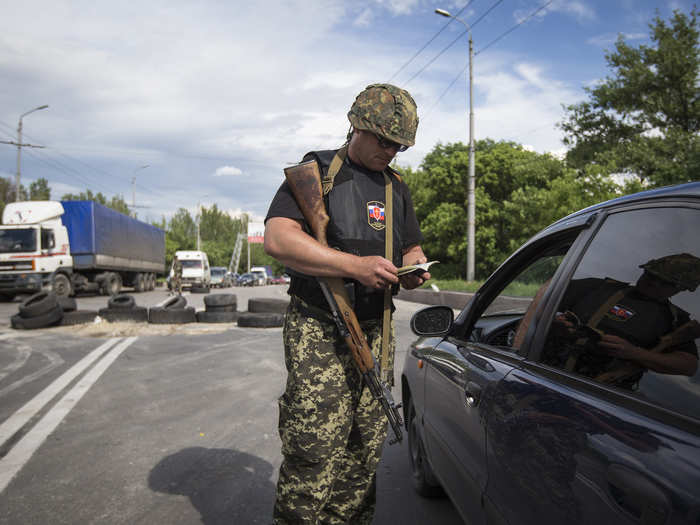 In Donetsk, the separatist Russian Orthodox Army mans checkpoints and asks all drivers entering or leaving the city to present their passports.