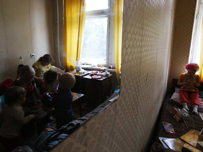 Here, children of families who have fled the fighting play in one of the temporary accommodations available in Ilovaisk. The way things are going, people displaced by the fighting in eastern Ukraine might not be able to go home for a while.