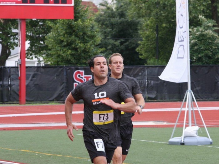 UBS director Robert Befumo warms up with some strides before his race.