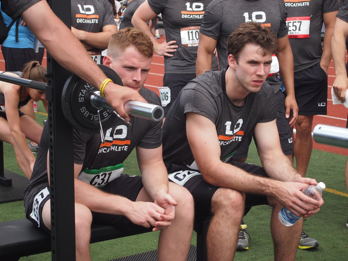 Friends/ former Yale football players Jacob Stoller (Barclays) and Tom McCarthy (Morgan Stanley) watch the bench press event.