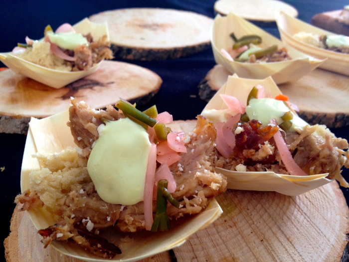 Chile pulled pork on flatbread with avocado crema, cotija cheese, and pickled vegetables from Deschutes Brewery in Bend, Oregon.