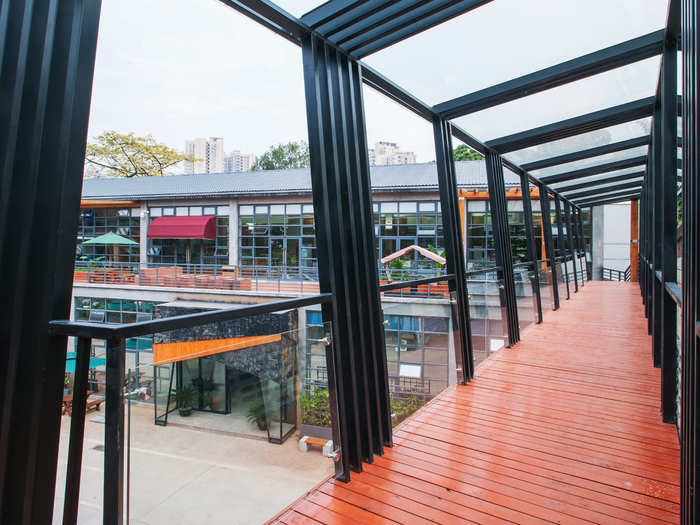 To solve the problem, the design team created these open bridges to connect four of the six buildings.