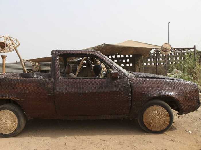 This car in Nigeria is covered with woven raffia palm cane.