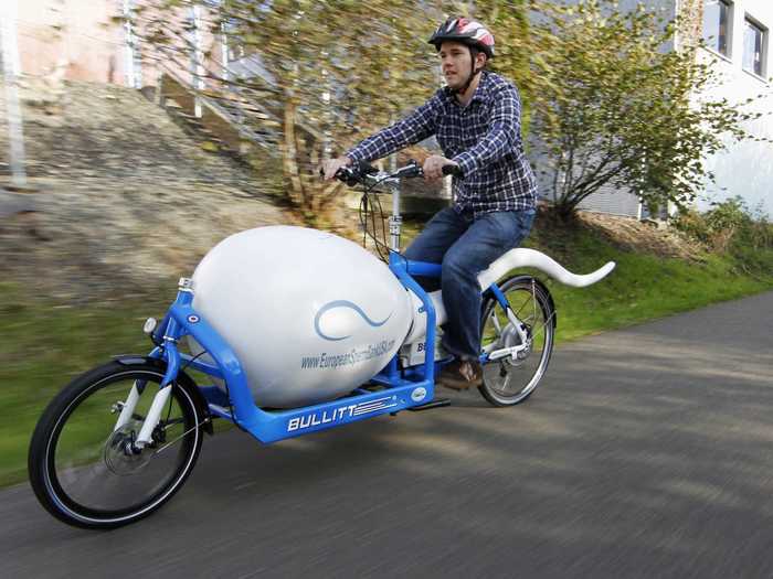 A biological analyst at the Seattle Sperm Bank rides the Sperm Bike, a custom bike that transports donor sperm to the bank in liquid nitrogen cooled vacuum containers.