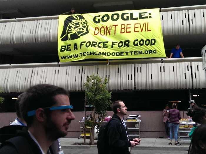 They also draped this banner outside a parking garage.