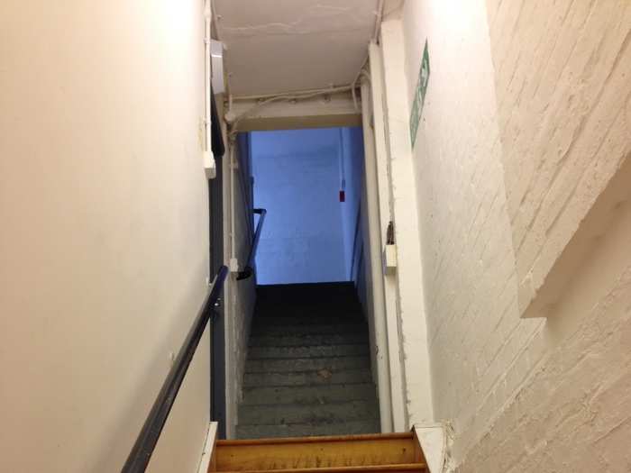 You have to climb up a bunch of gloomy staircases to get to the top of the building.