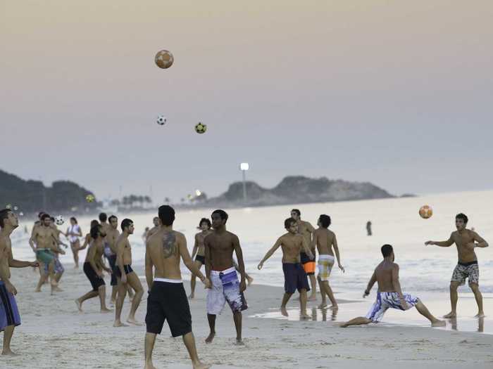 Cariocas frequently play soccer on the beach.