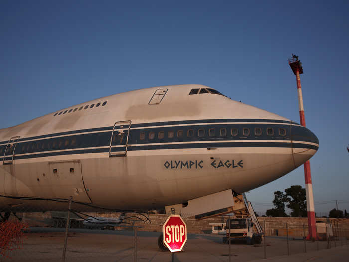 This Olympic Boeing 747-200 sits engineless, basking in the Greek sunshine.