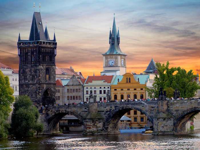 Walk across the 612-year-old Charles Bridge in Prague, the Czech Republic.