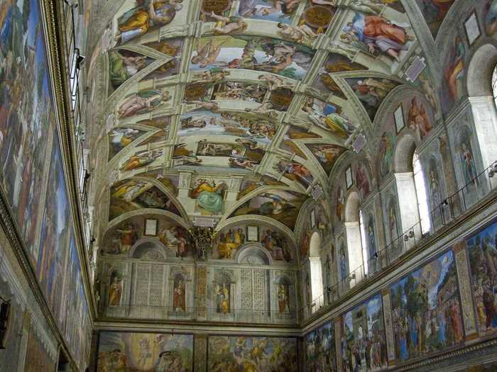 Marvel at the ceiling of the Sistine Chapel in Vatican City.