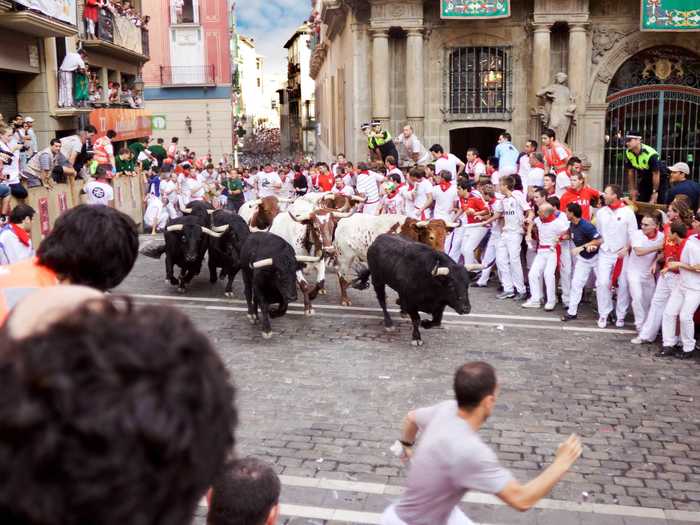 Run with the bulls in Pamplona, Spain.