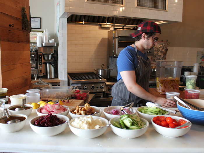 Sous Chef Justin Bernstein is preparing lunch, which Livestream employees can enjoy for $10.