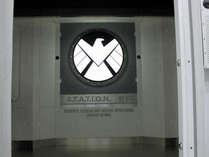 Sliding doors reveal S.T.A.T.I.O.N. stands for Scientific Training and Tactical Intelligence Operative Network.