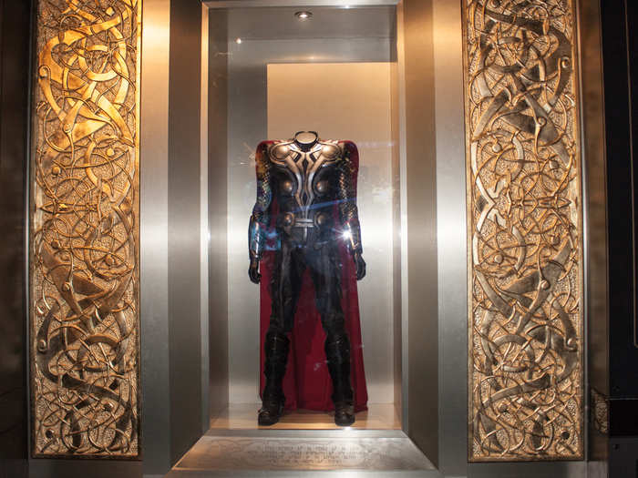 ... to Thor (Chris Hemsworth) in his own Throne room ...