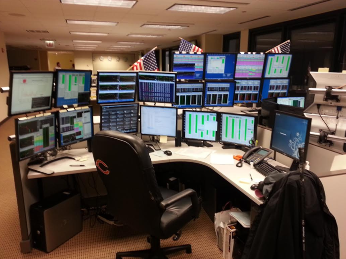 This trader is based in Chicago as seen seen from the Bears sticker on his chair!  He uses Sterling Software, which recently merged with PTS (Professional Trading Solutions). He watches CNBC via slingbox on one of his screens.