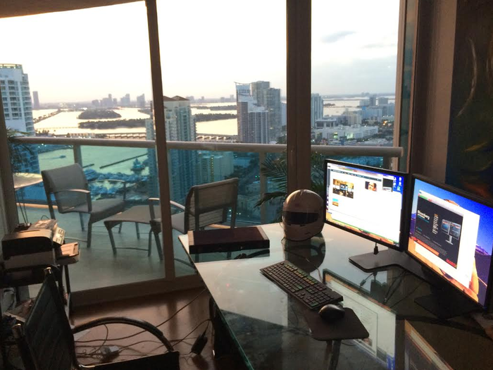 This trader has a sleek set-up in Miami. He also trades from remote locations.