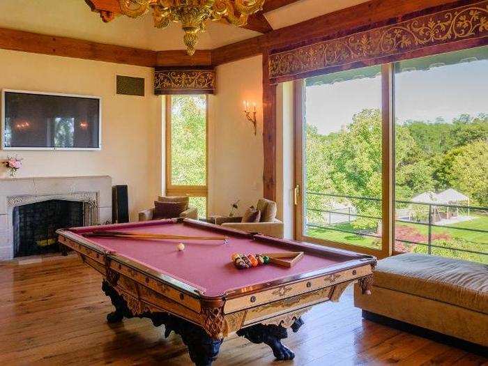 There are plenty of rooms for recreation. Here is the billiards room.