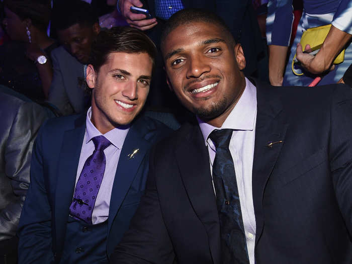 NFL player Michael Sam and boyfriend Vito Cammisano looked great in the crowd.