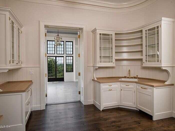 There are plenty of cabinets and lots of counter space.