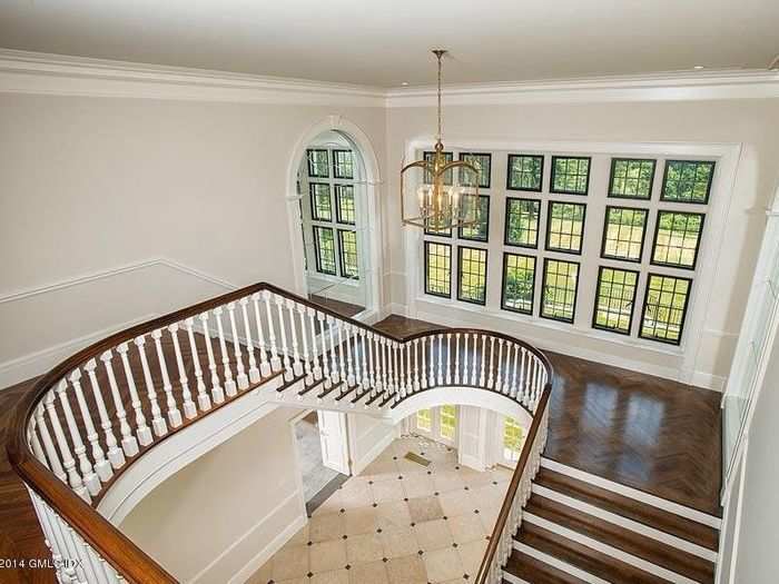 This winding staircase makes the home feel even more luxurious.