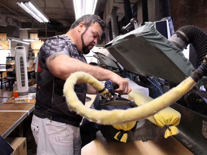 Pedro Sanchez, an employee of 29 years, presses the jackets in between operations. In mass-production facilities, the suit won’t be pressed until it’s finished, which makes it lie stiff on the body. Here, a suit takes on a man’s complicated geometric shape from the very start.