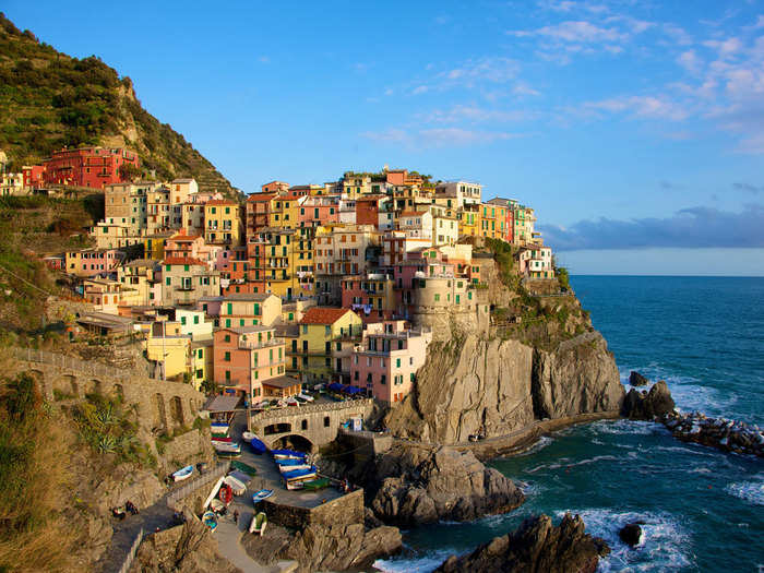 Hike in scenic Cinque Terre and explore the charming cliffside villages.