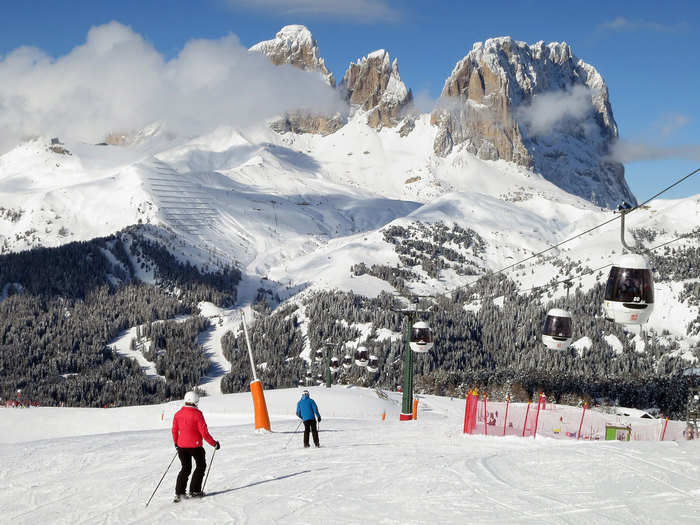 Ski the Dolomites, a mountain range in the northern Italian Alps, and explore the charming ski village of Cortina d