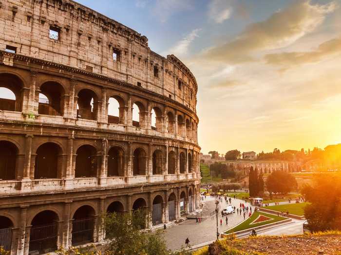 Marvel at the enormous Colosseum in Rome.