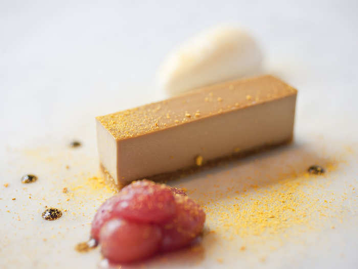 The brown sugar tart looks lovely next to piles of poached Muscat grapes and stem ginger ice cream.