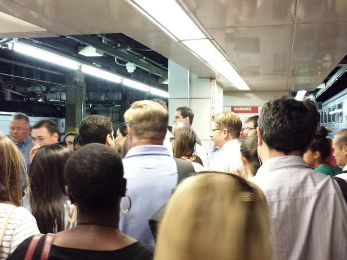 Once the train pulls into New York Penn Station, there is a huge press as everyone hurries out.