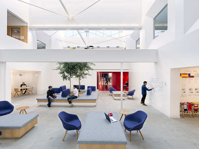 In this courtyard, each of the walls can be used like a whiteboard and then wiped clean.