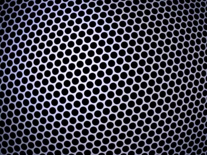 There are infinite black and white dots on a plane. Prove that the distance between one black dot and one white dot is one unit.