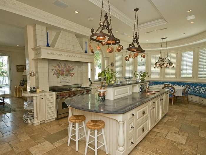 The tile on the floor and behind the stove is gorgeous.