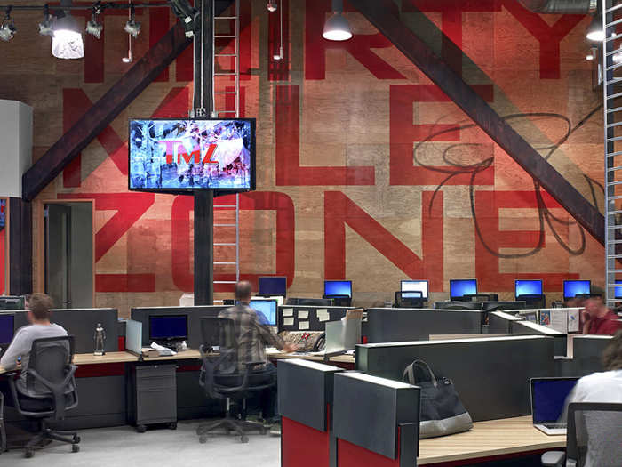 The words "Thirty Mile Zone" are printed on the wall because that is what "TMZ" stands for. It