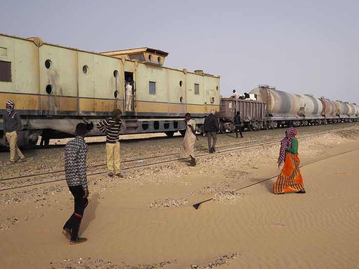 On paper, the train officials frown on hitching a ride on the Mauritania Railway, but it