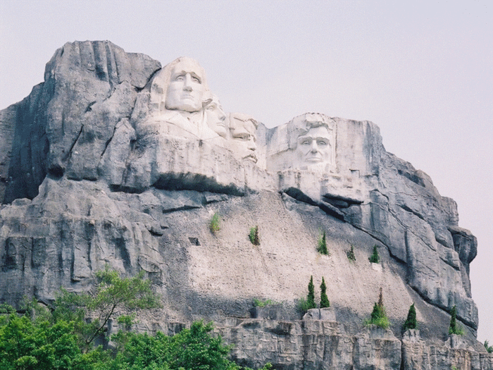 In the America section, the White House can be seen in close proximity to Mount Rushmore.