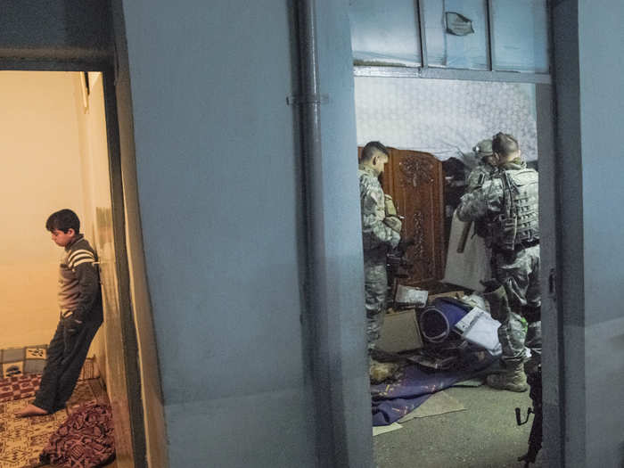 American soldiers stormed this house after seeing two young men eyeing them and fidgeting. Though nothing was found in the house, the soldiers detained the boys after explosive residue was found on their hands. Explosives tests are notoriously unreliable.