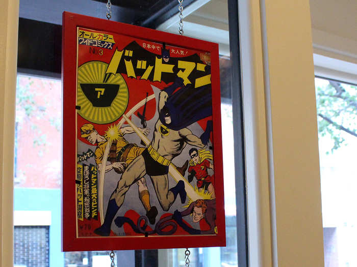 The restaurant closes between 3:30 and 5:30 to prep for dinner. I get a chance to meander around and check out the art, like this commissioned comic book cover that shows Batman with a bowl of ramen emblazoned on his suit.