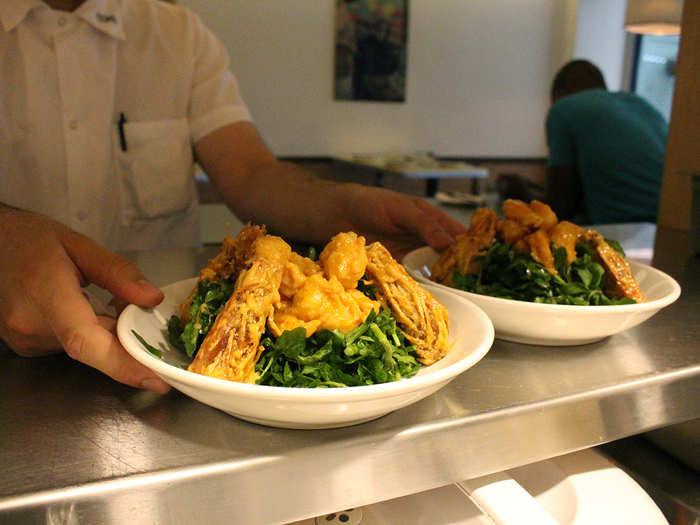 The kewpie ebi ($14) consists of lightly battered prawns smothered in smoked chili and served on a bed of watercress.