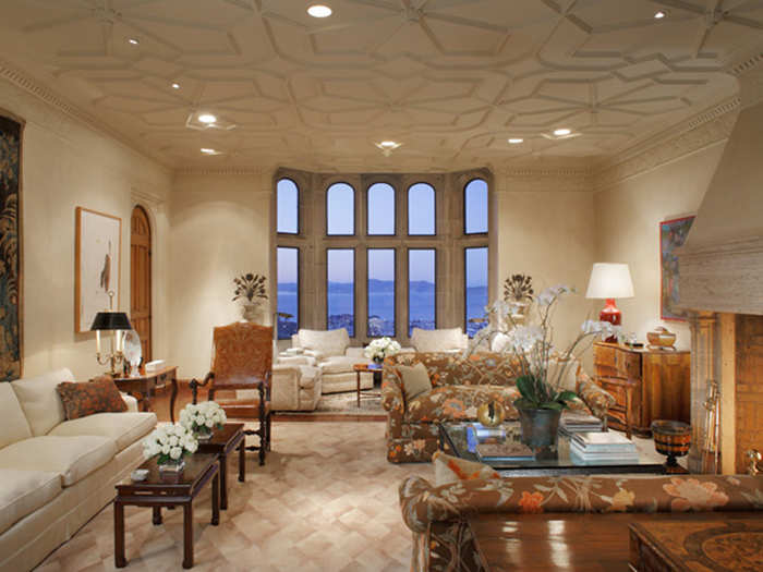 The formal sitting room has a lovely pattern on the ceiling.