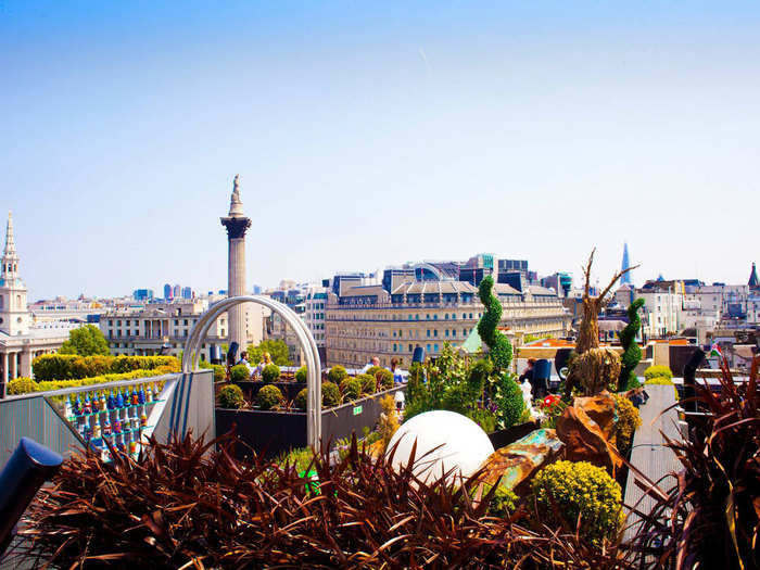 Drink outdoors on a rooftop.