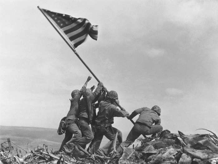 This iconic photo that won Joe Rosenthal the Prize in 1945 depicts U.S. Marines of the 28th Regiment, 5th Division, raising the American flag atop Mt. Suribachi, Iwo Jima, on February 23, 1945. Strategically located only 660 miles from Tokyo, the Pacific island became the site of one of the bloodiest, most famous battles of World War II against Japan.