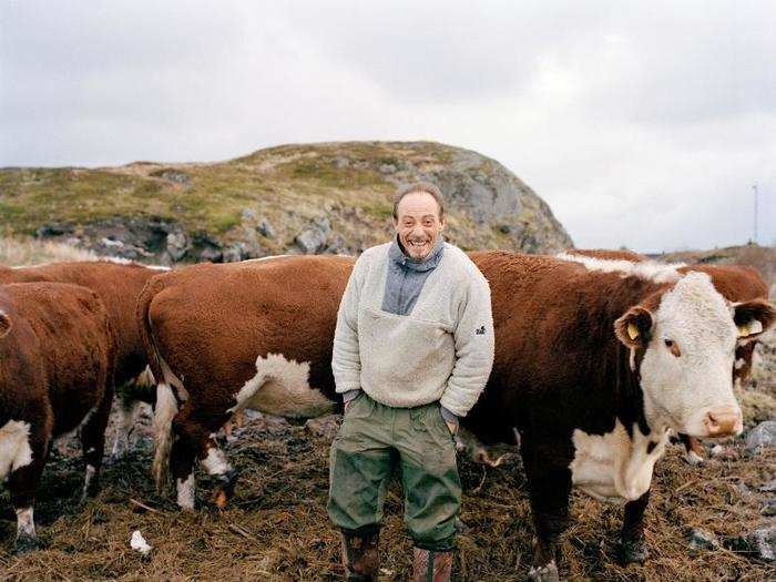 Roger Møen is seen here enjoying a happy moment with his cattle in Træna, Norway. His cows are one of the most northernly-located herd of Hereford cattle in the world. Træna is a remote and beautiful island in the Arctic Circle, 33 miles off the coast of Norway.