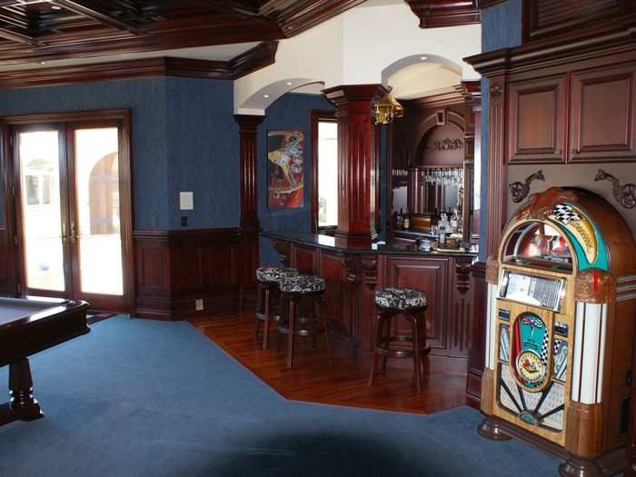 The billiard and game room features a full-service bar and jukebox.